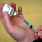 Japan suspends use of two vaccines